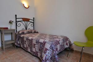 Cama o camas de una habitación en Hospedaje Facundo