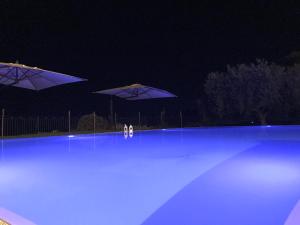 The swimming pool at or close to I Casali della Parata