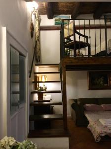 a staircase in a room with a bunk bed at La Dimora Del Professore in Naples