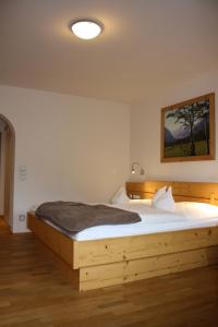 Postel nebo postele na pokoji v ubytování Hotel Gasthof Adler