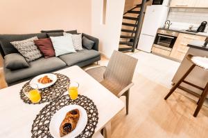 Kuchyňa alebo kuchynka v ubytovaní BpR Paulay Cozy Apartment