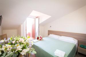 Posteľ alebo postele v izbe v ubytovaní Hotel Concorde + 15 fotografií
