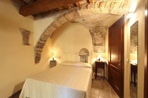 Voodi või voodid majutusasutuse Residence Borgo Da Mare toas
