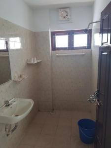 Koupelna v ubytování Nikhil Residence + 28 fotografií