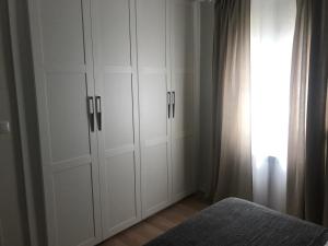 A bed or beds in a room at Apartamento Avenida de Colón con Aire Acondicionado