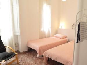 Posteľ alebo postele v izbe v ubytovaní La Roqueta completo en pleno centro