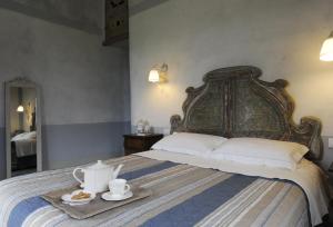 Postel nebo postele na pokoji v ubytování La casa di Arianna