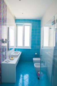 Kúpeľňa v ubytovaní B & B REGINA MARGHERITA + 18 fotografií