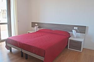 Postel nebo postele na pokoji v ubytování Four Rooms Guesthouse