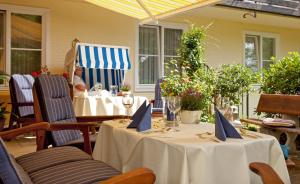 Posezení v ubytování Boutiquehotel Das Haus am Walde