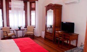 TV a/nebo společenská místnost v ubytování Hotel Papiros