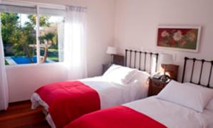Postel nebo postele na pokoji v ubytování Hotel Papiros