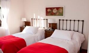 Postel nebo postele na pokoji v ubytování Hotel Papiros