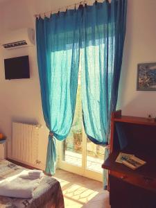 Letto o letti in una camera di Gò Gò House
