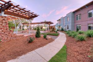 a walkway in front of a building at The Crash Pad: An Uncommon Hostel in Chattanooga