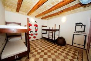Ein Etagenbett oder Etagenbetten in einem Zimmer der Unterkunft Vallettastay Dormitory shared hostel