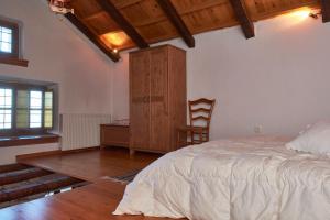 Een bed of bedden in een kamer bij Red Villa's Guesthouse
