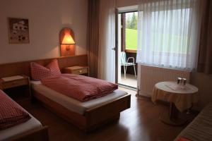 Posteľ alebo postele v izbe v ubytovaní Landhotel Wolf