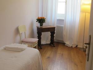 A bed or beds in a room at Le Porte di Marzo
