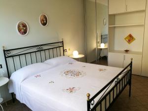 Un pat sau paturi într-o cameră la GattoMoro