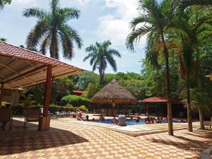 A piscina localizada em Hotel Rio Tempisque ou nos arredores