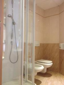 Koupelna v ubytování SIRIOHotel