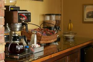 a counter with baskets of food and a blender at The Courtland Hotel & Spa in Fort Scott
