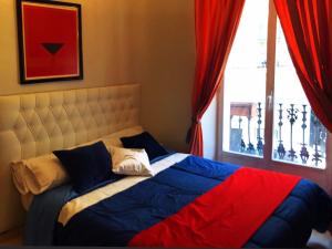 Łóżko lub łóżka w pokoju w obiekcie BOOKINGHAM ★Apartaments & Suites
