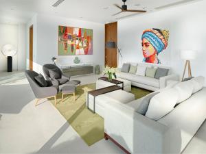 Ein Sitzbereich in der Unterkunft Malaiwana Residences