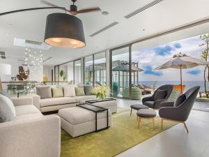 Ein Sitzbereich in der Unterkunft Malaiwana Residences