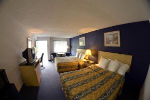 En eller flere senge i et værelse på Superlodge Absecon/Atlantic City