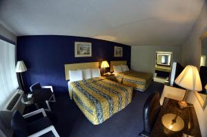 Letto o letti in una camera di Superlodge Absecon/Atlantic City