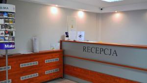 a store with a reception counter in a pharmacy at Hotel Felix in Krakow