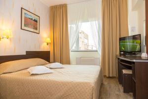 Postel nebo postele na pokoji v ubytování Hotel Germisara