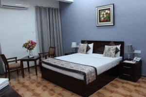 Letto o letti in una camera di Majan Guest House L.L.C.