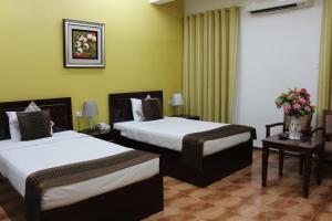 Letto o letti in una camera di Majan Guest House L.L.C.