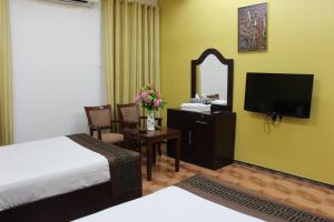 TV o dispositivi per l'intrattenimento presso Majan Guest House L.L.C.