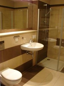Kúpeľňa v ubytovaní Apartamenty Olympic Park