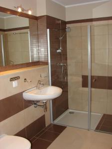 Kúpeľňa v ubytovaní Apartamenty Olympic Park