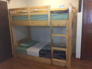 a couple of bunk beds in a room at Mountain View GuesthouseChiangmai in Chiang Mai