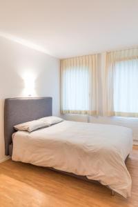 Ένα ή περισσότερα κρεβάτια σε δωμάτιο στο Chesa Rivarel - Pontresina
