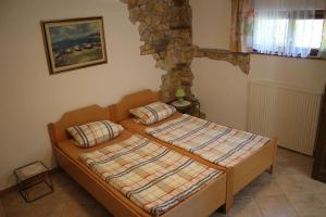 Postel nebo postele na pokoji v ubytování Apartmenthaus Fa