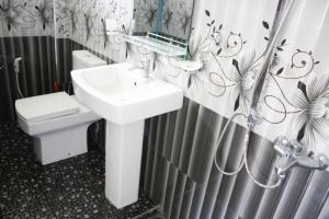 Koupelna v ubytování Elegant Home Stay