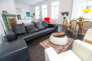 Część wypoczynkowa w obiekcie Grand Soho Apartment