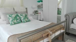 Łóżko lub łóżka w pokoju w obiekcie Apartamento Calero