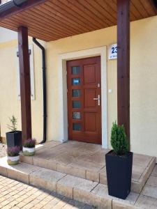 Exteriér alebo vchod do ubytovania Villa Złote Wydmy
