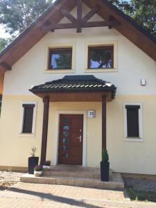 Exteriér alebo vchod do ubytovania Villa Złote Wydmy