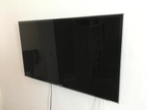 TV a/nebo společenská místnost v ubytování Traunsee Apartment 60 m2