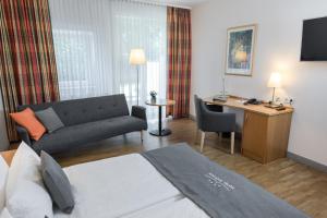 Ένα ή περισσότερα κρεβάτια σε δωμάτιο στο Hotel Nickisch