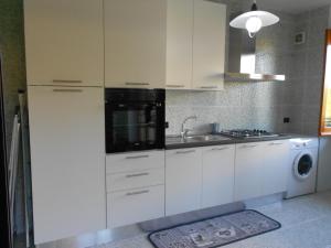 Kuchyň nebo kuchyňský kout v ubytování Il Gelsomino